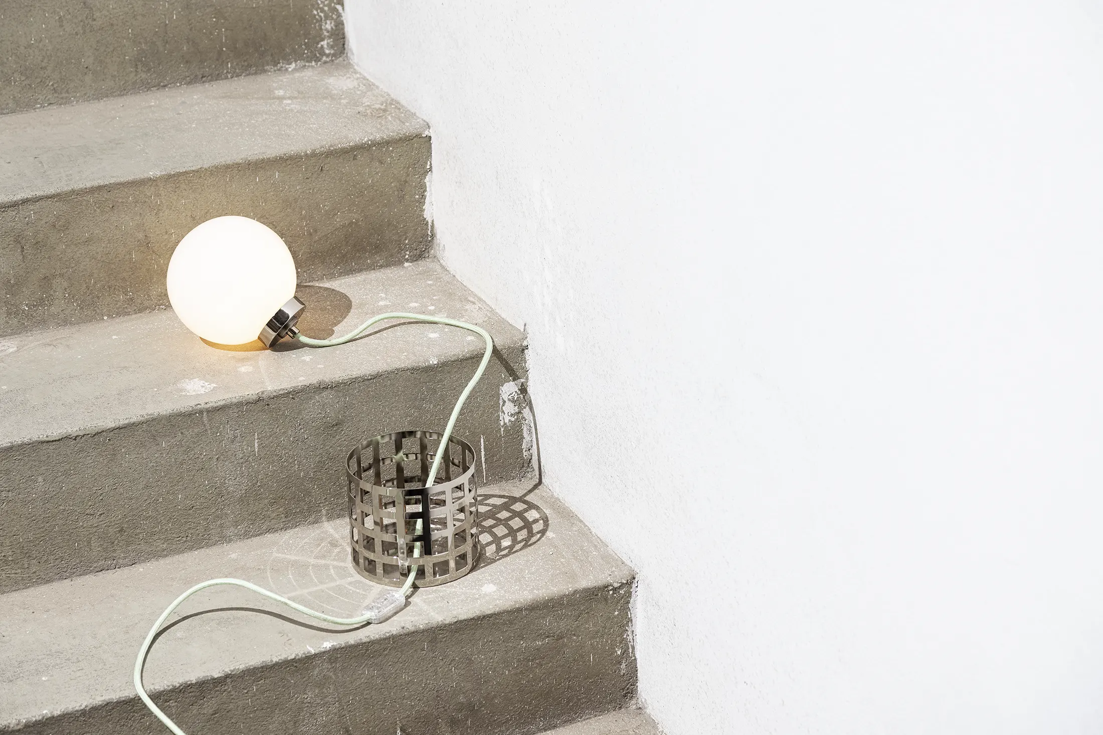 Full Moon Ride Table Lamp - Inspired by the iconic chrome finishes of the Mid Century era. Features a meticulously crafted grid pattern accentuating its geometric harmony. Conceptually alluring and transcending boundaries of conventional lighting.